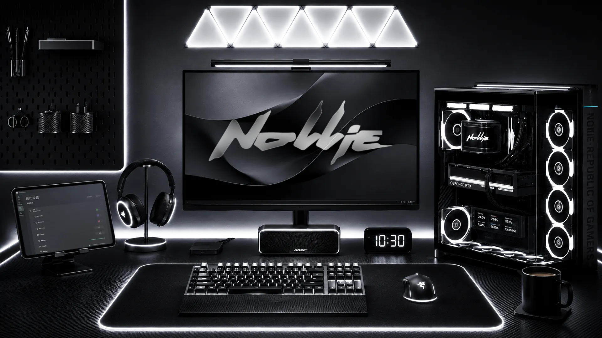 A PC desk setup driven by a Nollie controller — wall light panels, case fans, keyboard and LED strips each running their own lighting effect